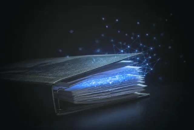 A worn business binder at night with fine light rising from its open pages